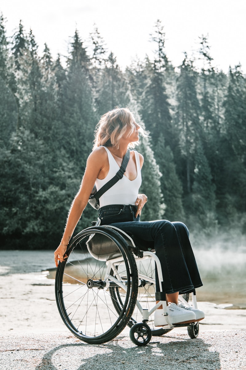 woman riding wheelchair near trees, Disability Insurance